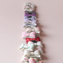 Afbeelding in Gallery-weergave laden, Cato losse strikjes Klaar voor Kerst (medium voor dun haar)
